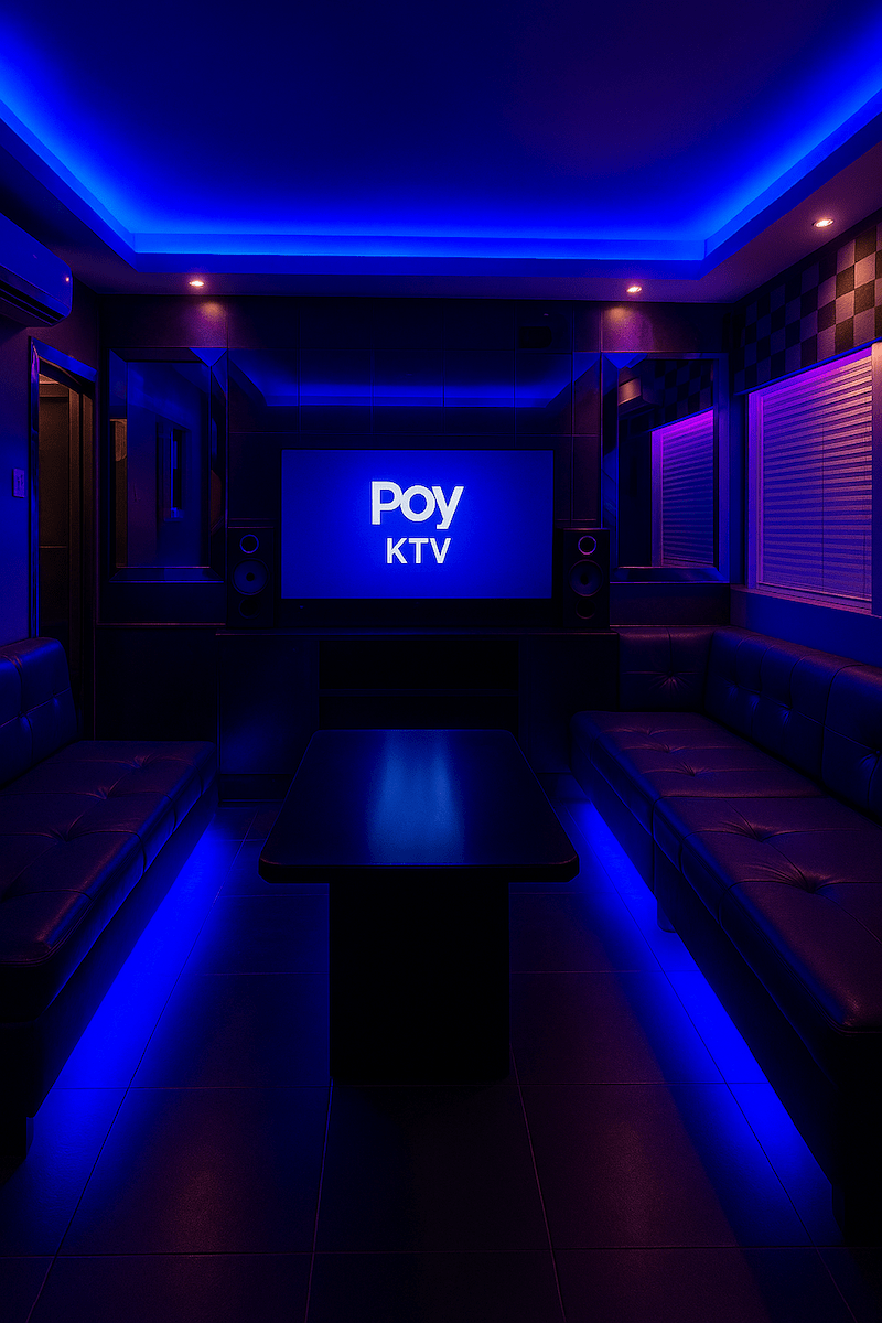 Interior view of Poy KTV room with lights and seating